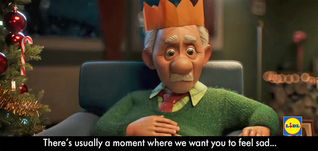 image shows an animated image of an elderly man looking sad and wearing a Christmas party hat